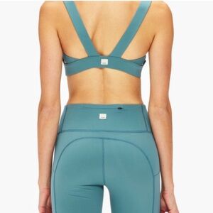 Vuori Teal Supportive Sports Bra and leggings